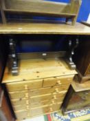 A modern pine chest of two short over four long drawers,
