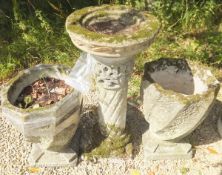 Two large composite stone garden planters on stands,
