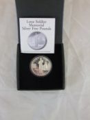 A Lone Soldier Memorial silver £5 coin,