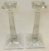 A pair of Russian cut glass candlesticks