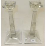 A pair of Russian cut glass candlesticks