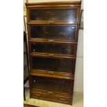 An early 20th Century Globe Wernicke five section bookcase with single drawer base