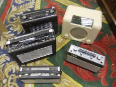 A collection of five vintage radios comprising a Bush radio, Hacker Herald, Sovereign No.