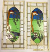 A pair of leaded and coloured glass panels CONDITION REPORTS Both with some cracks/broken