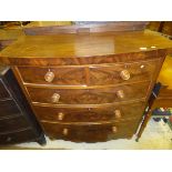 A Victorian mahogany bow fronted chest of two short and three long graduated drawers over a shaped