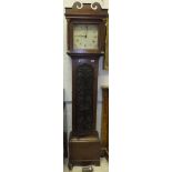 An oak cased longcase clock, the 30 hour movement with square enamelled dial inscribed "Wenham,