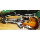 A Yamaha SF500 Super Flighter electric guitar, No'd. 002385, together with a Yamaha hard case