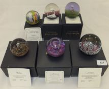A collection of six Caithness glass paperweights - "Coronet", No'd. 33/750, "Star Beacon", No'd.