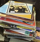 A large collection of LPs to include Elvis, Bill Haley, The Beatles Greatest (Dutch import),