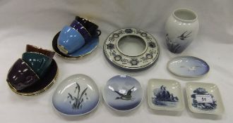 A collection of decorative china wares to include a Royal Copenhagen faience dish bearing monogram