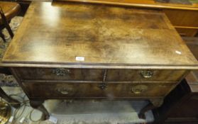 An early 18th Century walnut chest of two short and one long drawer,