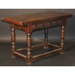 A 17th Century oak refectory style serving table,