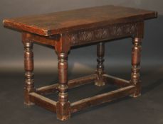 A 17th Century oak refectory style serving table,