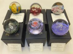 A collection of six Caithness glass paperweights - "Fugue", No'd. 252/750, "Galactica", No'd.