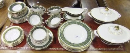 A Royal Doulton "Vanborough" pattern dinner service for eight place settings,