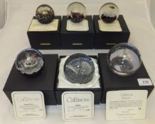 A collection of six Caithness glass paperweights - "Rhapsody", No'd. 80/400, "Zephyr", No'd.