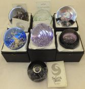 A collection of seven Selkirk Glass paperweights - "Moon Glow", No'd. 167/450, "Ice Coral", No'd.