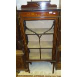 An Edwardian mahogany inlaid and painted single door display cabinet,