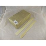 A shagreen cigarette box (faded), together with two circa 1900 ivory paper knives,
