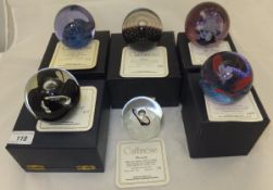 A collection of six Caithness glass paperweights - "Harmony", No'd. 19/1000, "Black Gem", No'd.