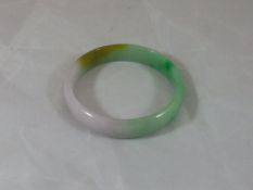 A jade bangle CONDITION REPORTS Overall with some general wear and scuffs, internal diameter of