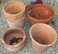 Five various large terracotta plant pots