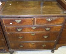 An 18th Century walnut chest,