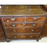 An 18th Century walnut chest,