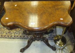 A 19th Century walnut fold over card table,