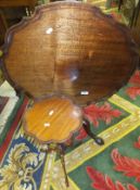 A mahogany tea table in the George III taste,