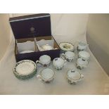 A P & O Cruises "Aurora 2012 World Circumnavigation" teapot and two matching cups and saucers,