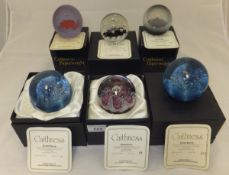 A collection of six Caithness glass paperweights - "Flower Form", No'd.