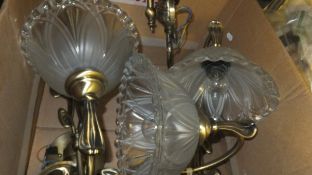 Four brassed bodied single branch wall lights with glass shades