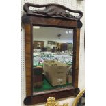 A walnut framed rectangular wall mirror with applied carved rosewood surmount as a sleeping woman (