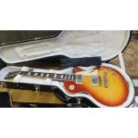 A Gibson Les Paul Traditional HC electric guitar circa 2009, Serial No. 012790435, together with
