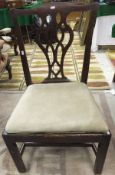 A composite set of four Victorian mahogany dining chairs in the provincial Chippendale manner,