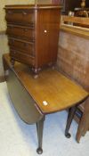 A 19th Century mahogany drop-leaf dining table, raised on pad feet,