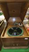 An HMV oak cased table top gramophone CONDITION REPORTS Overall with wear, scuffs, scratches, some