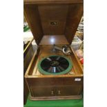 An HMV oak cased table top gramophone CONDITION REPORTS Overall with wear, scuffs, scratches, some