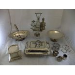 A collection of plated wares to include bottle holders, cruet stand, plinth base, entrée dish, etc.