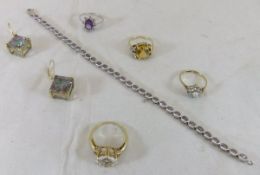 Four various gold mounted dress rings, a pair of 9ct gold and rainbow quartz earrings,