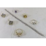 Four various gold mounted dress rings, a pair of 9ct gold and rainbow quartz earrings,