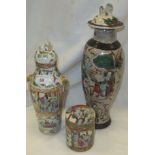 A late 19th / early 20th Century Chinese famille rose vase and cover with lion mask handles,