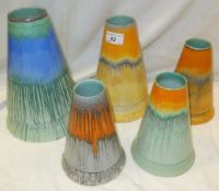 A collection of five Shelley pottery volcano vases with dripware decoration CONDITION REPORTS All