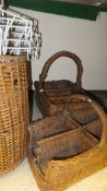 Three vintage wicker baskets, a large wooden ladle,