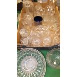 A box of various glassware to include two flagons and stoppers, decanter and stopper,