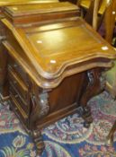 A reproduction mahogany Davenport desk