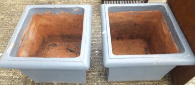 Two grey painted terracotta planters of square form