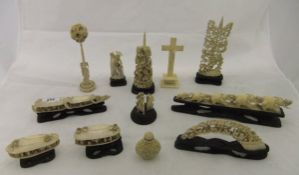 A collection of early 20th Century carved ivory ornaments, to include puzzle ball on stand,