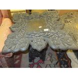 A 19th Century Indian folding table carved with flowers CONDITION REPORTS Top has various chips